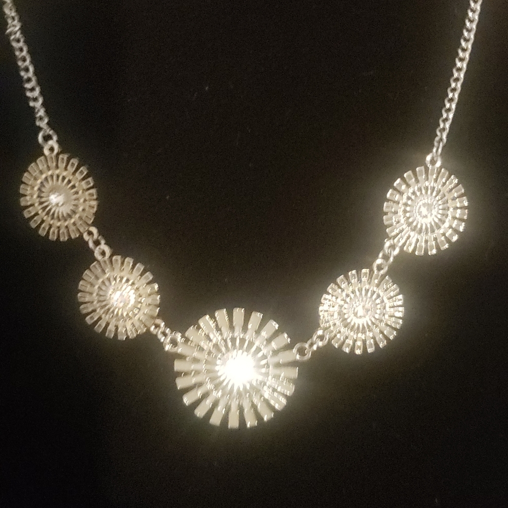 Stiling silver with diamonds